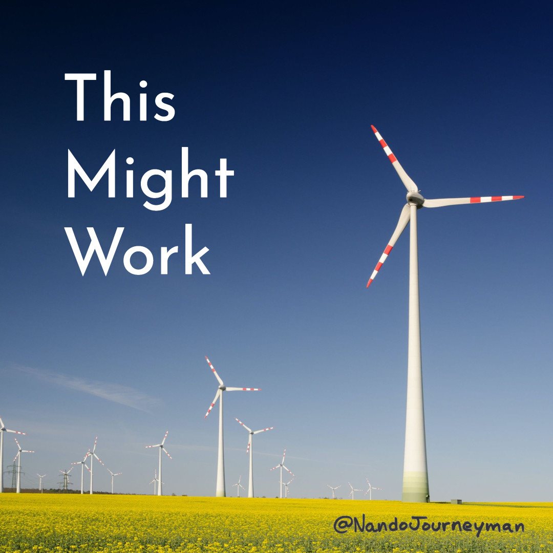 The words "This Might Work" over a background showing windmills